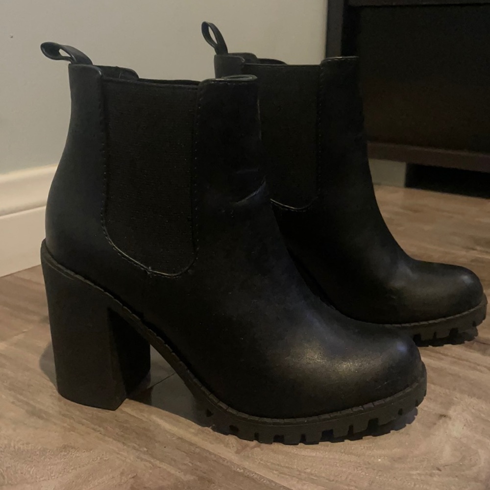 Black leather platform heel boots